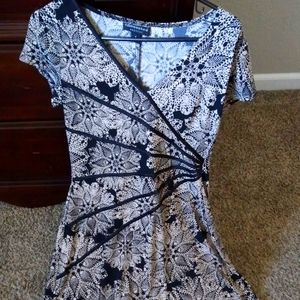 Black and cream patterned, A-line dress.